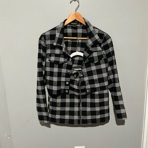 Matching plaid, jacket and skirt.